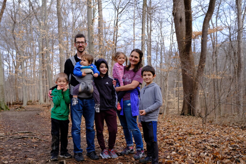 homeschooling family in the woods