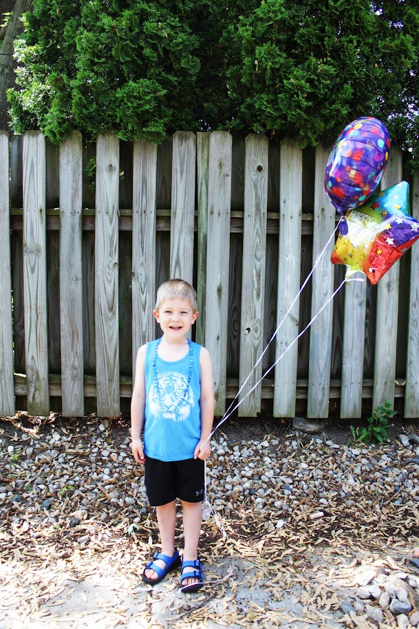 young boy turns six