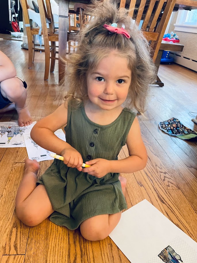 toddler homeschool girl coloring a picture