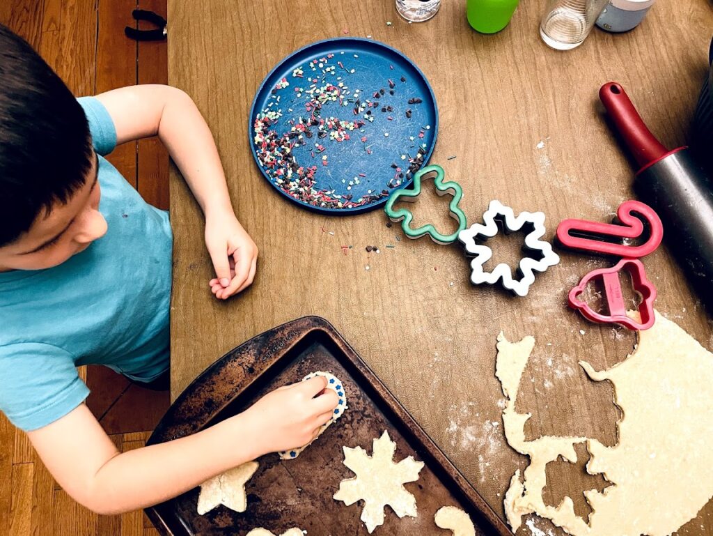 homeschool children making christmas cookies