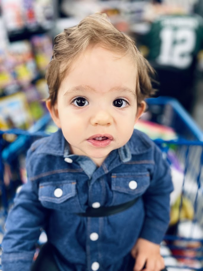 baby boy in shopping cart