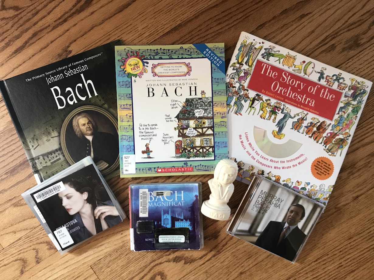 three books about js bach and three cds of bach's music