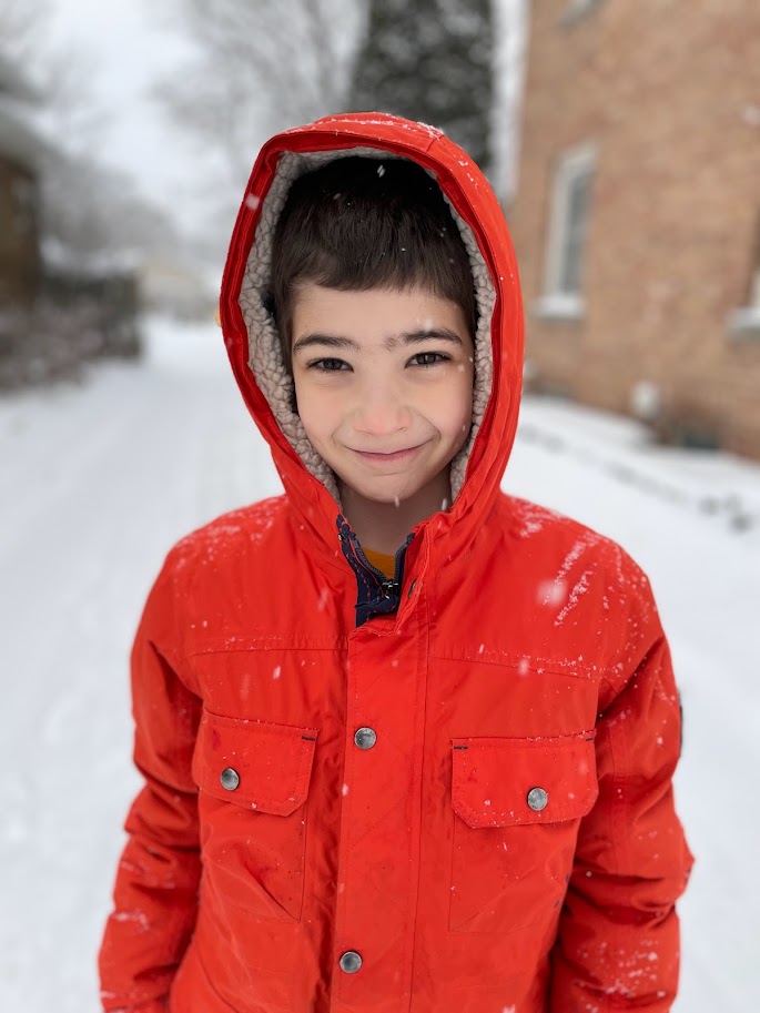 homeschool preteen playing in the snow