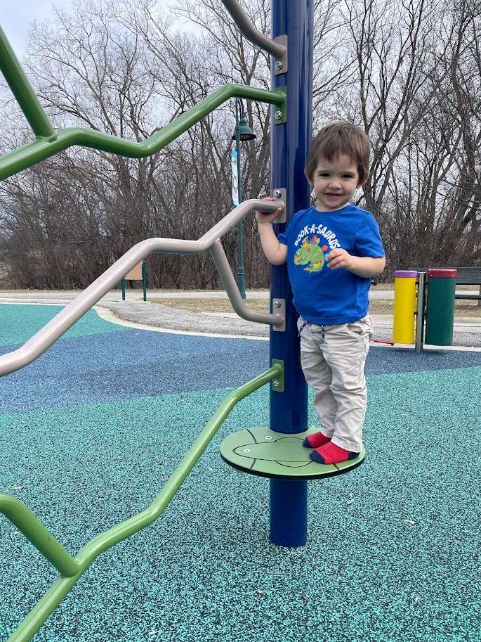 toddler homeschool boy at the playground