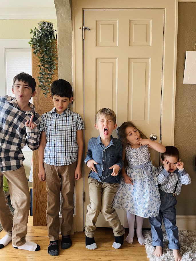 five homeschool children making silly faces