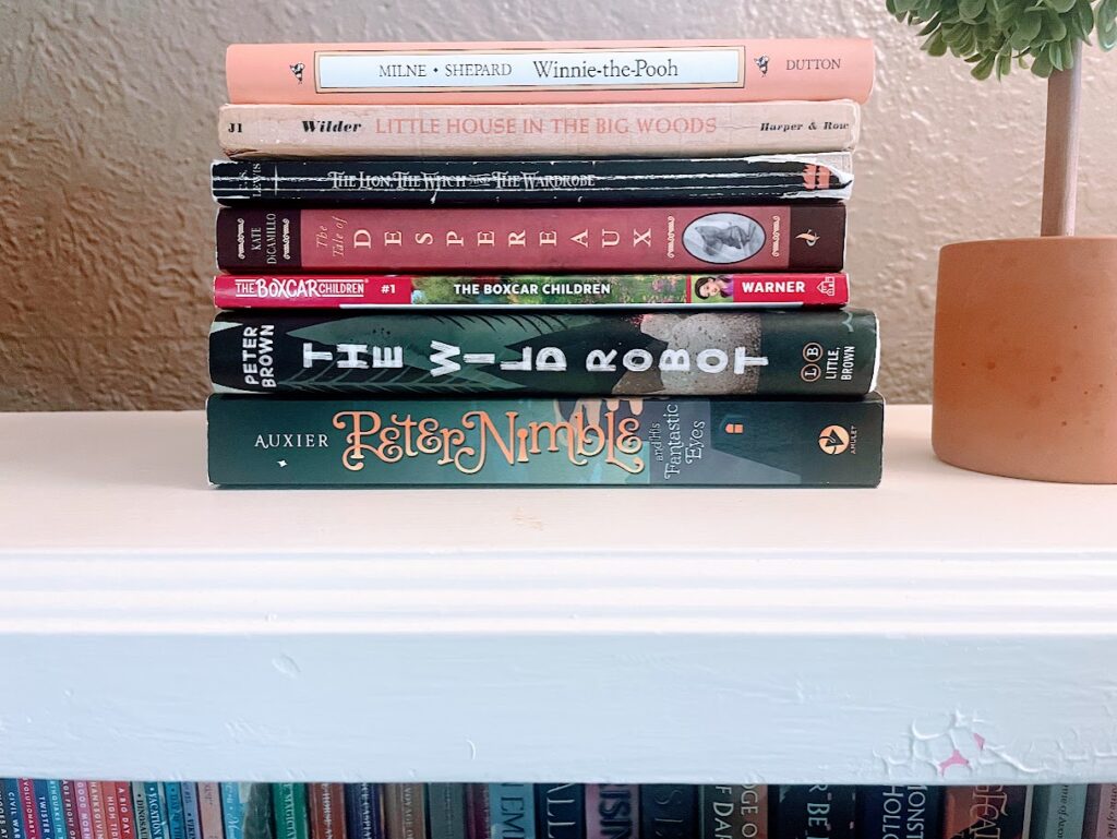 stack of best homeschool read alouds on a bookshelf