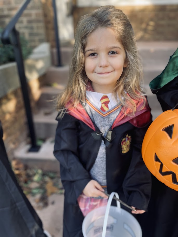 homeschool girl dressed up as Hermione for Halloween